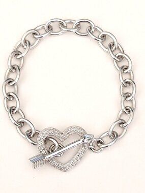 Silver textured heart with tiny faux diamonds and arrow toggle closure
